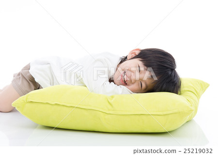 Cute Asian chid lying on big pillow 25219032