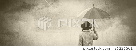 portrait of a young woman with umbrella and suitcase portrait of a young woman with umbrella and suitcase 25225561
