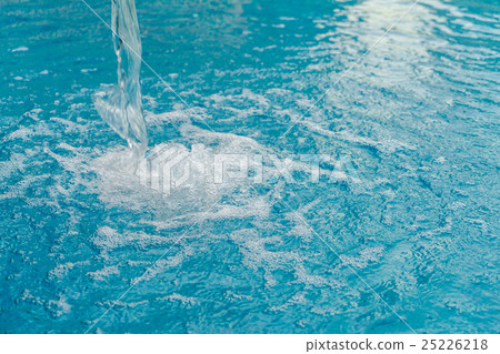 Blue swimming pool rippled water . Blue swimming pool rippled water . 25226218