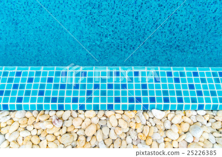 Blue swimming pool rippled water . Blue swimming pool rippled water . 25226385