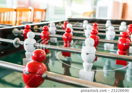 Football table game with red and white player . Football table game with red and white player . 25226690