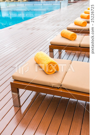 Swimming pool with relaxing seats . 25226725