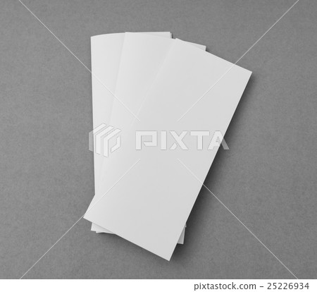 Trifold white template paper on gray background . 25226934