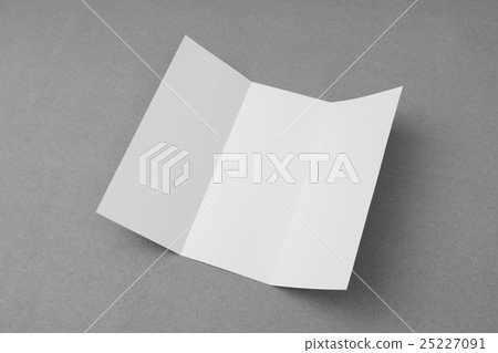 Trifold white template paper on gray background . 25227091