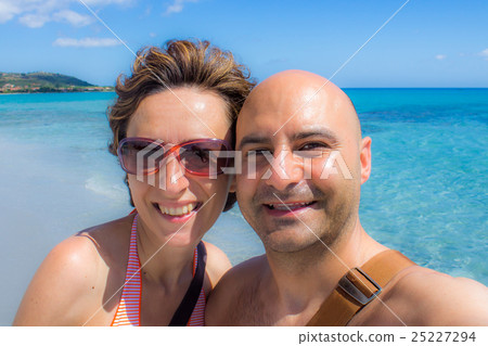 happy couple at the beach happy couple at the beach 25227294