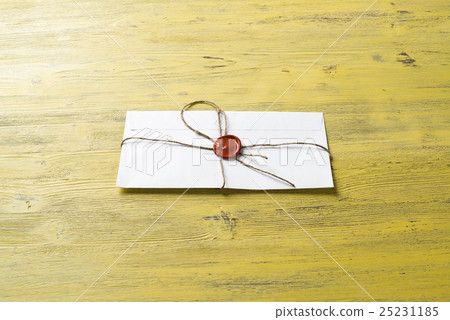 Letter with seal on table Letter with seal on table 25231185