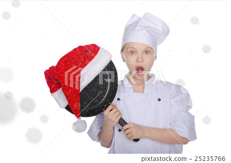Surprised girl, frying pan and Santa hat with snow 25235766