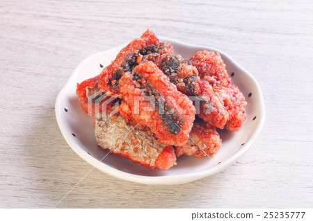 Fried red yeast eel is a popular dish in Taiwan Fried red yeast eel is a popular dish in Taiwan 25235777