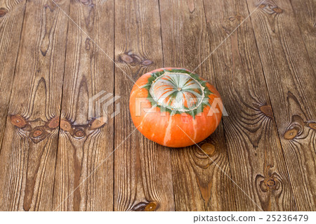 Pumpkin on wooden board Pumpkin on wooden board 25236479