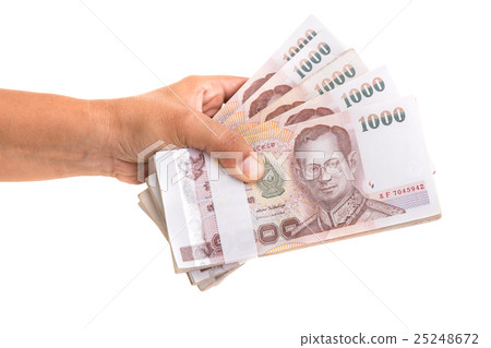 Hand giving Thai banknotes. Studio shot isolated on white background Hand giving Thai banknotes. Studio shot isolated on white background 25248672
