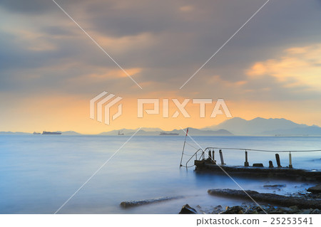 Sunset at a sea beach with beautiful sky 25253541