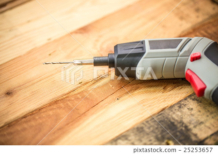 Hand Drill on Wood background, Home DIY Hand Drill on Wood background, Home DIY 25253657