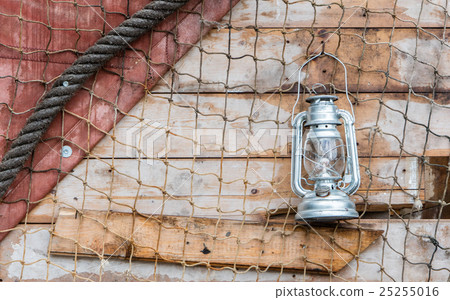 Old kerosene lamp hanging 25255016