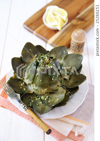 Artichoke with lemon and herbs Artichoke with lemon and herbs 25260251