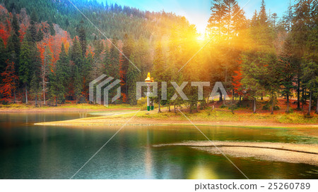 picturesque lake in the autumn forest picturesque lake in the autumn forest 25260789