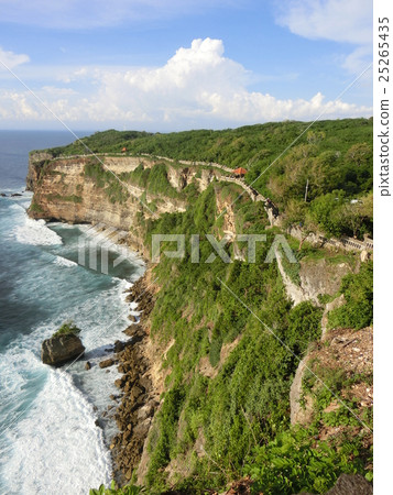 From the Bali Uluwatu Temple grounds, looking down the cliffs the Indian Ocean From the Bali Uluwatu Temple grounds, looking down the cliffs the Indian Ocean 25265435
