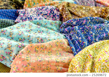 Heap of cloth fabrics 25269672