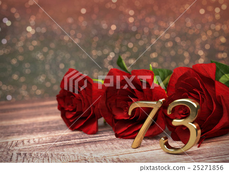 birthday concept with red roses on wooden desk 25271856