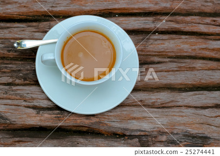 coffee cup on wood background coffee cup on wood background 25274441