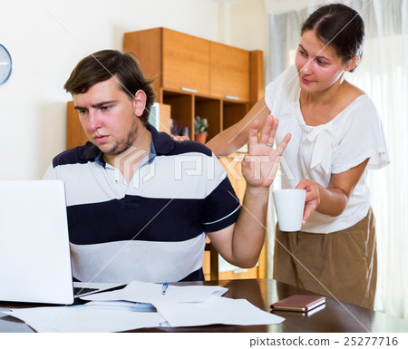 Portrait of husband workaholic and abandoned wife 25277716