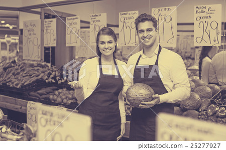 Sellers at vegetables market. 25277927