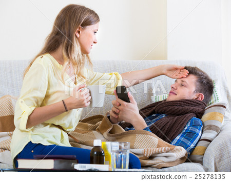 sick guy with flue and nursing girl 25278135