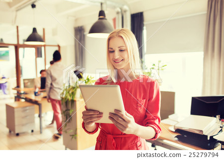 happy creative female office worker with tablet pc 25279794