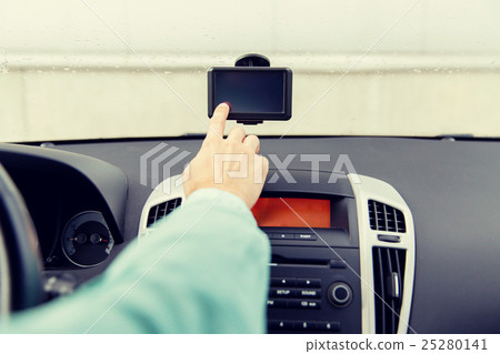 Stock Photo: close up of man with gps navigator driving car