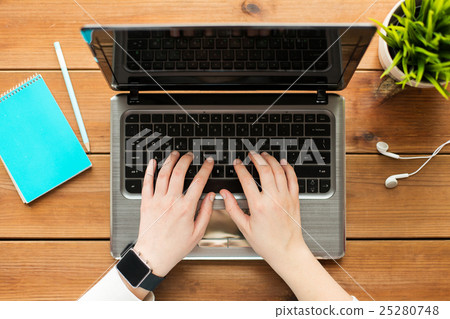 close up of woman or student typing on laptop close up of woman or student typing on laptop 25280748