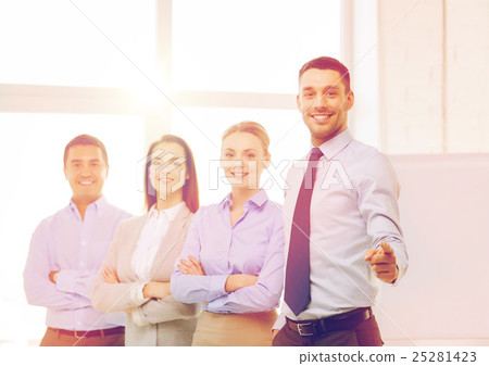 businessman in office pointing finger at you 25281423