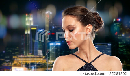 beautiful young asian woman over black background 25281802