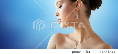 beautiful asian woman with earring and pendant beautiful asian woman with earring and pendant 25281833