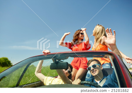 happy friends driving in cabriolet car happy friends driving in cabriolet car 25281882