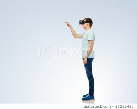 happy man in virtual reality headset or 3d glasses happy man in virtual reality headset or 3d glasses 25282485