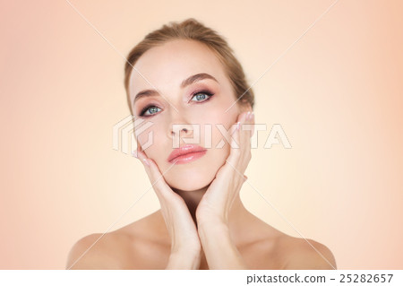 beautiful young woman face and hands 25282657