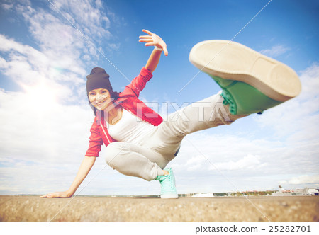 beautiful dancing girl in movement 25282701