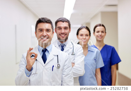 group of happy medics or doctors at hospital 25282738