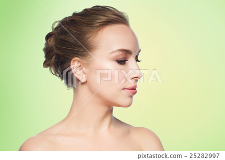 beautiful young woman face over white background 25282997