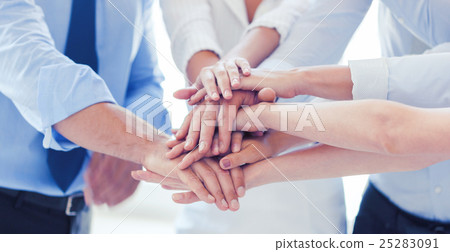 business team celebrating victory in office 25283091