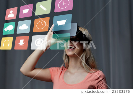 woman in virtual reality headset or 3d glasses woman in virtual reality headset or 3d glasses 25283176