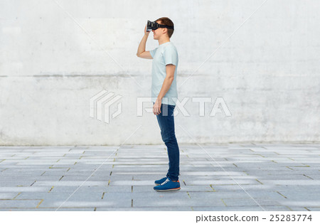 happy man in virtual reality headset or 3d glasses happy man in virtual reality headset or 3d glasses 25283774