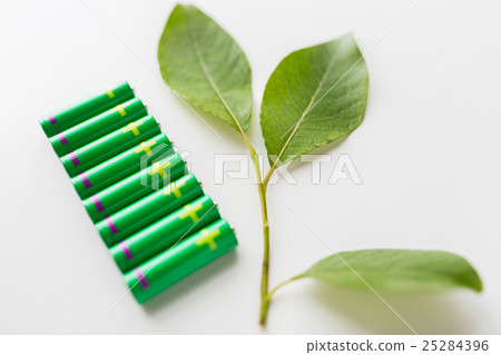 close up of green alkaline batteries close up of green alkaline batteries 25284396