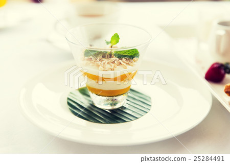 close up of dessert in glass at restaurant close up of dessert in glass at restaurant 25284491