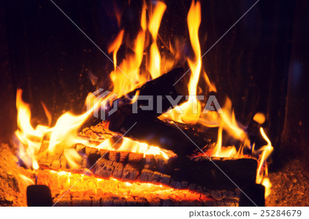 close up of firewood burning in fireplace close up of firewood burning in fireplace 25284679