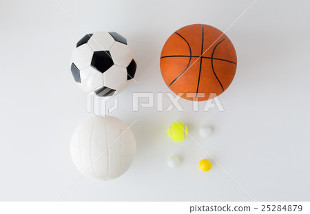 close up of different sports balls set over white close up of different sports balls set over white 25284879