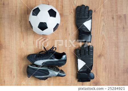 close up of soccer ball, boots and gloves 25284921