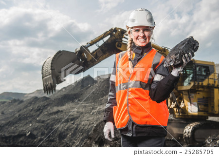 Worker with coal in the hands Worker with coal in the hands 25285705