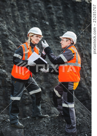 Workers with coal at open pit Workers with coal at open pit 25285707