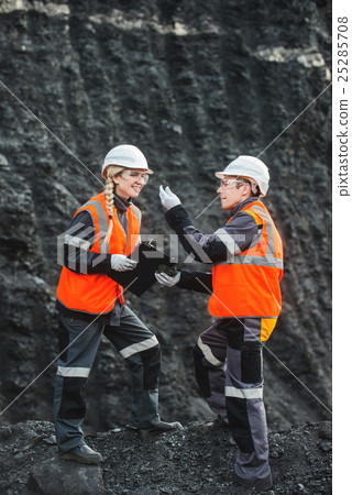 Workers with coal at open pit Workers with coal at open pit 25285708