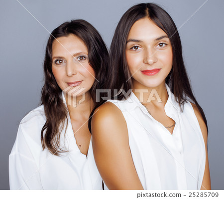 cute pretty teen daughter with mature mothr 25285709